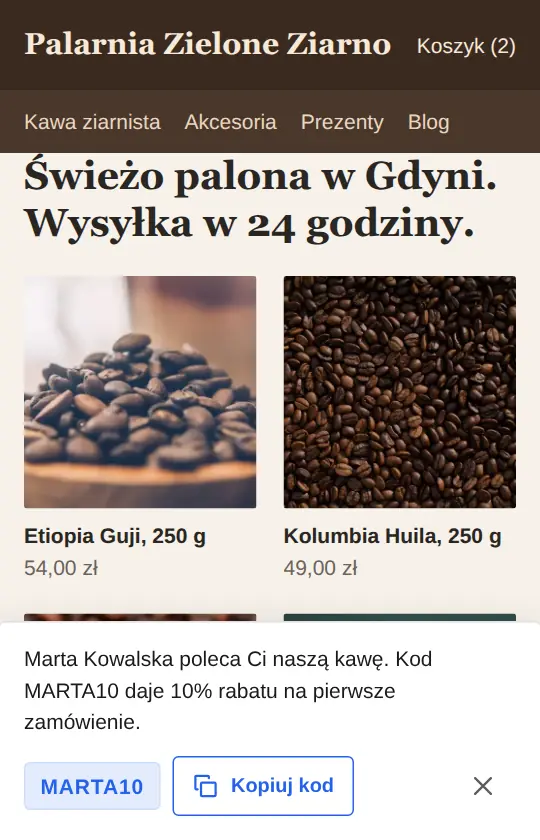 Baner z kodem MARTA10 przyklejony do dołu ekranu telefonu w stylu A.